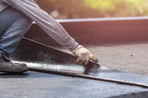 Professional Waterproofing technician working in Oyster Bay, NY